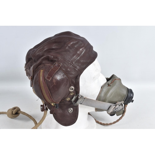 280 - A LEATHER RAF MID WWII LEATHER FLYING HELMET, together with goggles, The main construction of the he... 