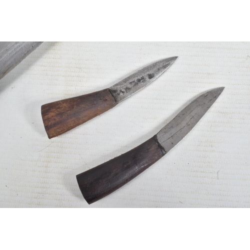 329 - A KUKRI STYLE KNIFE IN ITS ORIGINAL SHEAF, the blade is not decorated and shows some age related wea... 