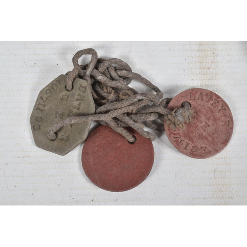 330 - A BOX OF ASSORTED MILITARIA, including canvas belts and holsters, three strung dog tags for 10571193... 