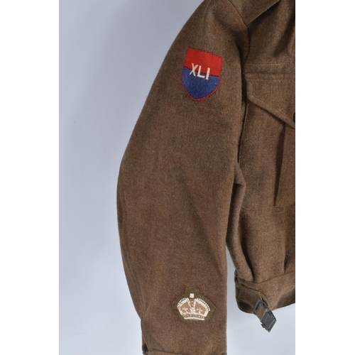 336 - A 1946 PATTERN BRITISH BATTLEDRESS BLOUSE WITH 41st ARMY GROUP RA INSIGNIA, the jacket is size 6 and... 