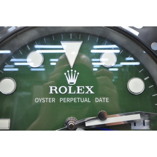 1203 - A ROLEX OYSTER PERPETUAL DATE, GMT - MASTER II, SUPERLATIVE CHRONOMETER DEALERS ADVERTISING WALL CLO... 