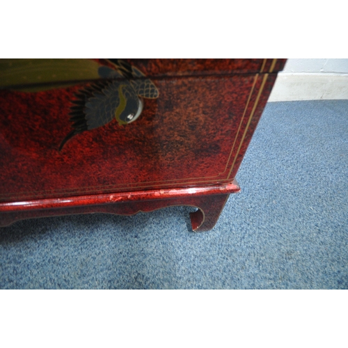 1212 - A 20TH CENTURY RED LACQUER AND CHINOISERIE MARRIAGE CHEST, depicting a variety of flowers and birds,... 