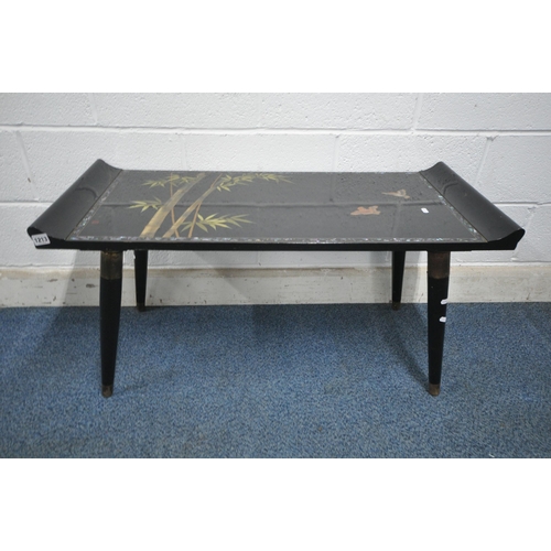 1213 - A 20TH CENTURY BLACK LACQUER AND CHINOISERIE COFFEE TABLE, with raised ends, raised on cylindrical t... 