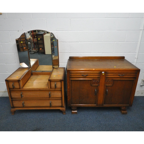 1215 - AN EARLY 20TH CENTURY OAK SIDEBOARD, with a raised back, fitted with two drawers, above double cupbo... 