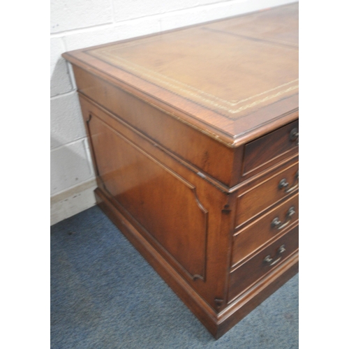 1225 - A LARGE MAHOGANY TWIN PEDESTAL DESK, with a tanned leather writing surface, eight assorted drawers, ... 