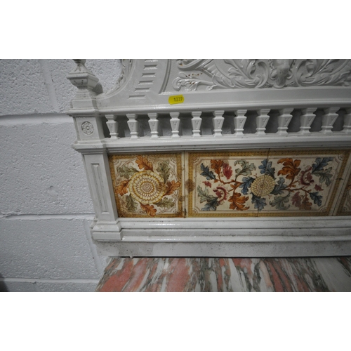 1239 - AN EARLY 20TH CENTURY WHITE PAINTED MARBLE TOP CAST IRON WASHSTAND, with an arched bevelled edge mir... 