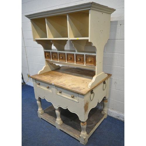 1247 - A PARTIALLY PAINTED KITCHEN ISLAND, the top with six divisions, and six double sided drawers, atop a... 