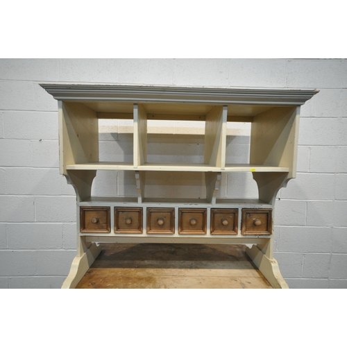 1247 - A PARTIALLY PAINTED KITCHEN ISLAND, the top with six divisions, and six double sided drawers, atop a... 