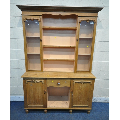 1249 - A 19TH CENTURY OAK DRESSER, the four tier plate rack, flanked by two glass doors, atop a base with t... 