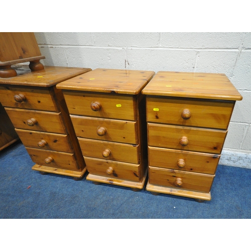 1251 - A SELECTION OF MODERN PINE FURNITURE, to include a desk, fitted with eight drawers, width 127cm x de... 