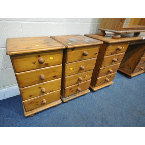 1251 - A SELECTION OF MODERN PINE FURNITURE, to include a desk, fitted with eight drawers, width 127cm x de... 