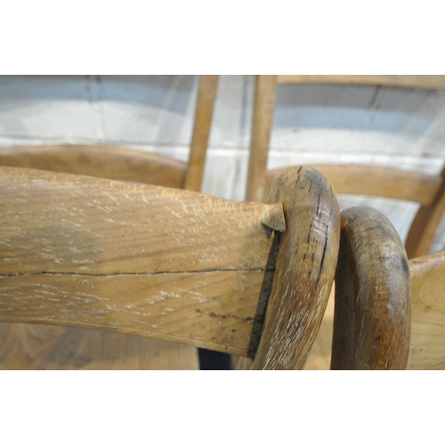 1270 - A SET OF FOUR ELM CHAIRS, raised on turned legs, and stretchers, along with a pair of elm seated whe... 