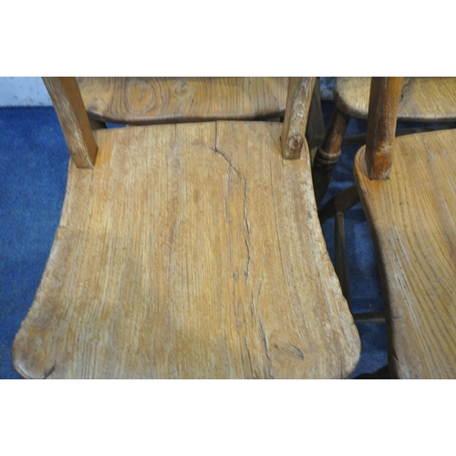 1270 - A SET OF FOUR ELM CHAIRS, raised on turned legs, and stretchers, along with a pair of elm seated whe... 