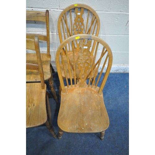 1270 - A SET OF FOUR ELM CHAIRS, raised on turned legs, and stretchers, along with a pair of elm seated whe... 