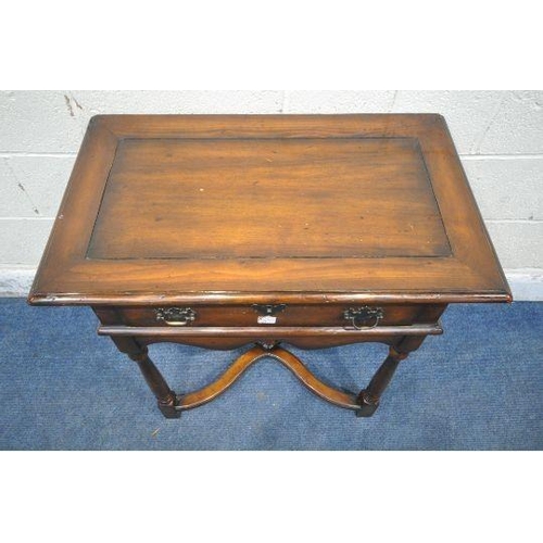 1271 - THEODORE ALEXANDER, A REPRODUCTION MAHOGANY SIDE TABLE / LOWBOY, with a single drawer, wavy apron, t... 