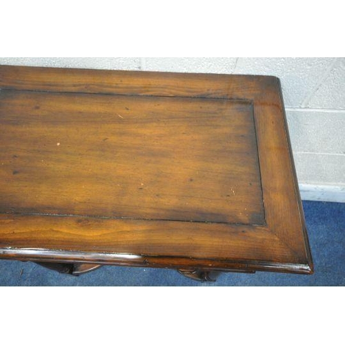 1271 - THEODORE ALEXANDER, A REPRODUCTION MAHOGANY SIDE TABLE / LOWBOY, with a single drawer, wavy apron, t... 