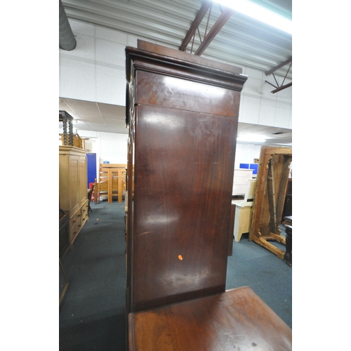 1297 - A 19TH CENTURY FRENCH FLAME MAHOGANY TWO DOOR WARDROBE, with bevelled edge mirror doors, enclosing a... 