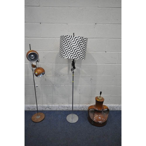 1302 - A MID-CENTURY GUZZINI STYLE FLOOR LAMP, with two adjustable lights, 146cm, along with a glazed potte... 