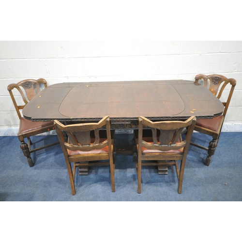 1306 - A 20TH CENTURY OAK SIX PIECE LOUNGE SUITE, comprising a draw leaf dining table, with a carved apron,... 