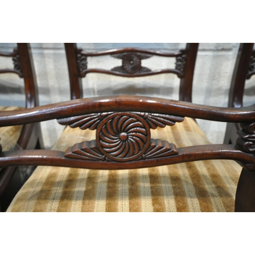 1321 - A SET OF EIGHT REGENCY MAHOGANY BAR BACK CHAIRS, including two carvers, with stripped drop in seat p... 