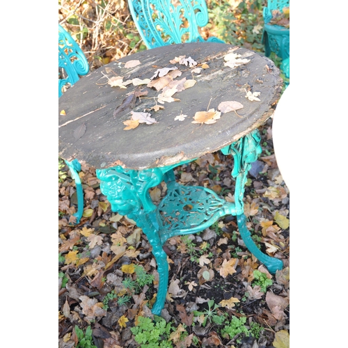 1035 - TWO VICTORIAN STYLE CAST IRON PUB TABLES, one with a white marble, 74cm round top, the other with a ... 