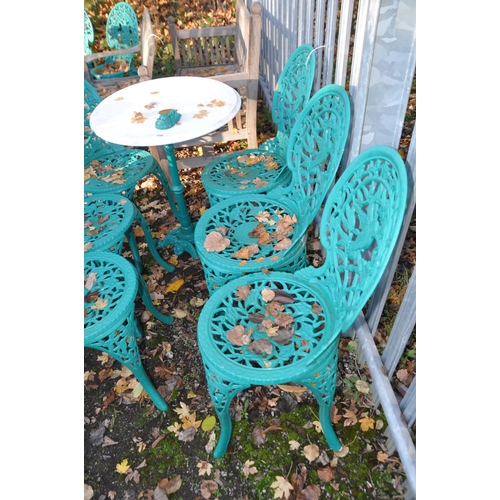 1038 - A SET SIX OF MODERN CAST GARDEN CHAIRS, with foliage and hummingbird to back rest, and a Victorian s... 