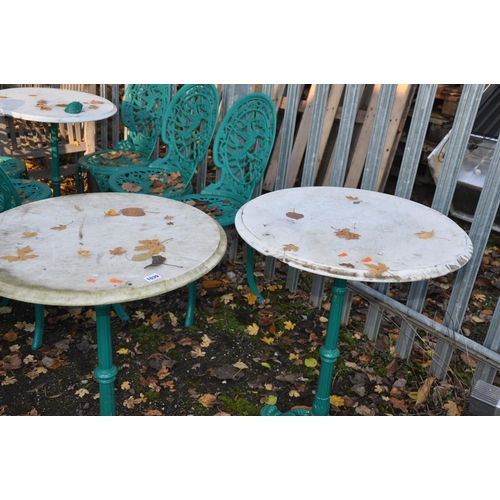 1039 - A PAIR OF VICTORIAN STYLE CAST IRON PUB TABLES with a tripod base and a white marble top, 59cm in di... 