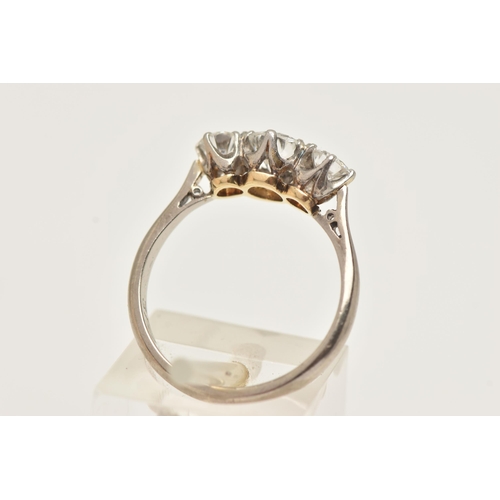 1 - A WHITE AND YELLOW METAL DIAMOND THREE STONE RING, set with graduating round brilliant cut diamonds,... 