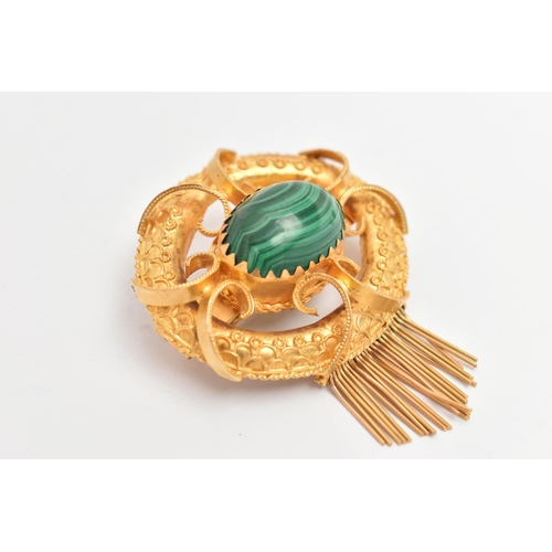 11 - A YELLOW METAL VICOTRIAN MALACHITE SET BROOCH, of an open work form, set to the centre with a malach... 