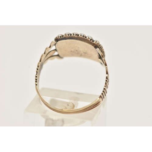 17 - A YELLOW METAL SPLIT PEARL MOURNING RING, of a rectangular form with vacant compartment missing glas... 