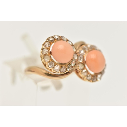 19 - A YELLOW METAL CORAL AND DIAMOND RING, of a cross over design, with two circular clusters each with ... 