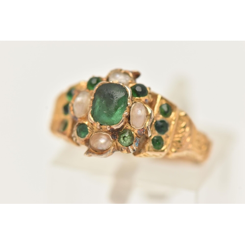 21 - A YELLOW METAL GREEN PASTE AND SPLIT PEARL CLUSTER RING, to the scrolling shoulders and textured ban... 