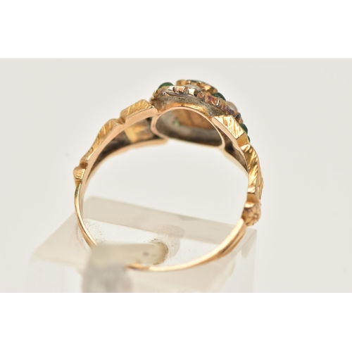 21 - A YELLOW METAL GREEN PASTE AND SPLIT PEARL CLUSTER RING, to the scrolling shoulders and textured ban... 