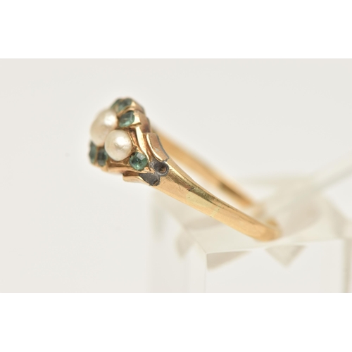 33 - A YELLOW METAL GEM SET RING, set with a row of three cultured split pearls, in a surround of cushion... 