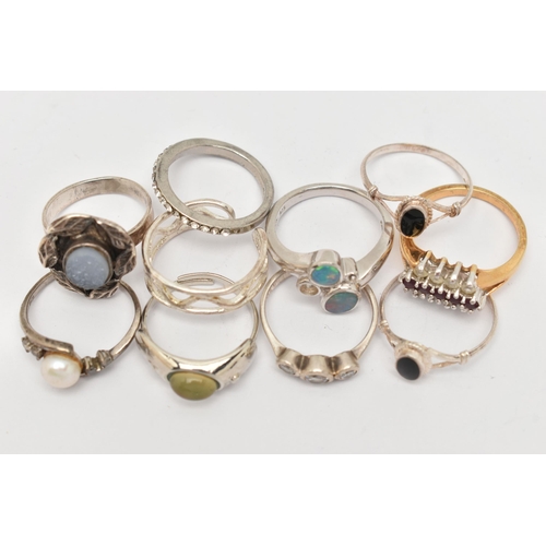 35 - AN ASSORTMENT OF TEN RINGS, to include four white metal rings, stamped 925, four white metal rings u... 