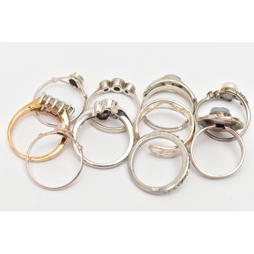 35 - AN ASSORTMENT OF TEN RINGS, to include four white metal rings, stamped 925, four white metal rings u... 