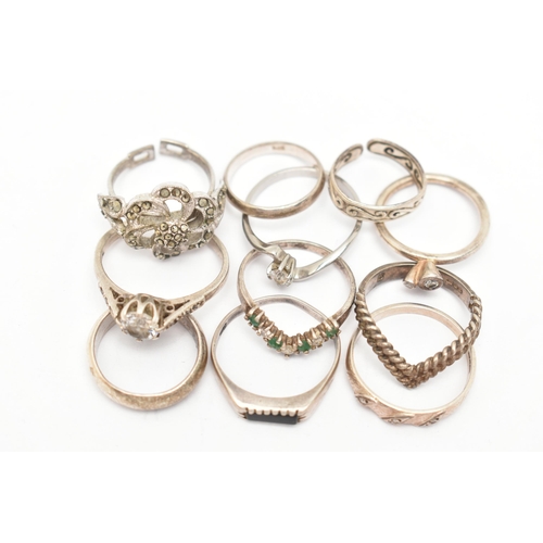 37 - AN ASSORTMENT OF ELEVEN RINGS, to include two silver rings, both with British hallmarks, approximate... 