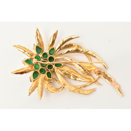 45 - A YELLOW METAL EMERALD SET SPRAY BROOCH, textured spray of leaves, set with a cluster of circular cu... 