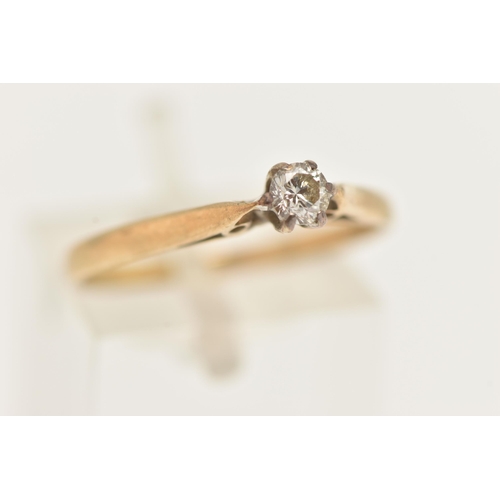 7 - A 9CT YELLOW GOLD DIAMOND SINGLE STONE RING, set with a round brilliant cut diamond, measuring appro... 