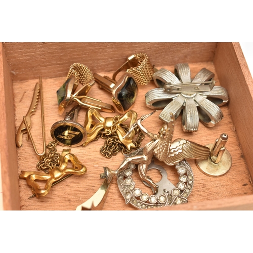 101 - A SMALL BOX OF COSTUME JEWELLERY, to include a double bow brooch, a clip and two pairs of cufflinks,