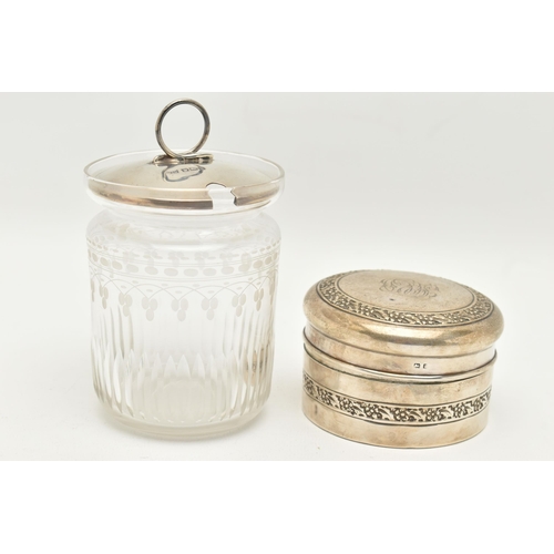 116 - A SILVER BOX AND SILVER LIDDED JAR, a circular form silver box with embossed detail and monogram eng... 