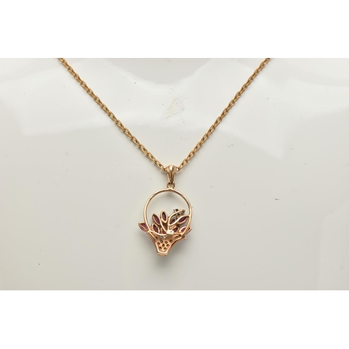 55 - A 9CT GOLD GEM SET PENDANT NECKLACE, the pendant in the form of a flower basket set with marquise cu... 