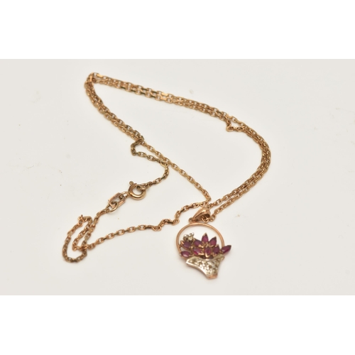 55 - A 9CT GOLD GEM SET PENDANT NECKLACE, the pendant in the form of a flower basket set with marquise cu... 