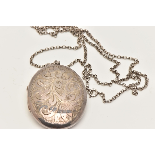 68 - A SILVER LOCKET AND CHAIN, the oval locket with engraved floral and foliate decoration, suspended fr... 