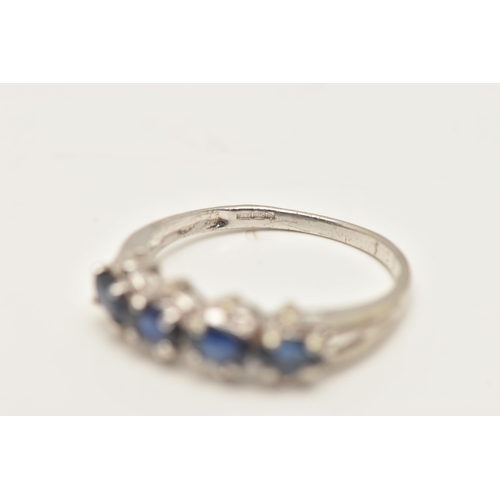 75 - A 9CT WHITE GOLD SAPPHIRE RING, designed as a line of four oval claw set sapphires, 9ct hallmark, ri... 