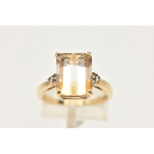 76 - A 9CT GEM RING, designed as a rectangular gem, possibly tourmaline, with colourless gem detail to th... 