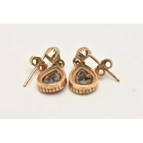 78 - A PAIR OF 9CT GOLD GARNET AND SPLIT PEARL DROP EARRINGS, each designed as a pear shape garnet suspen... 