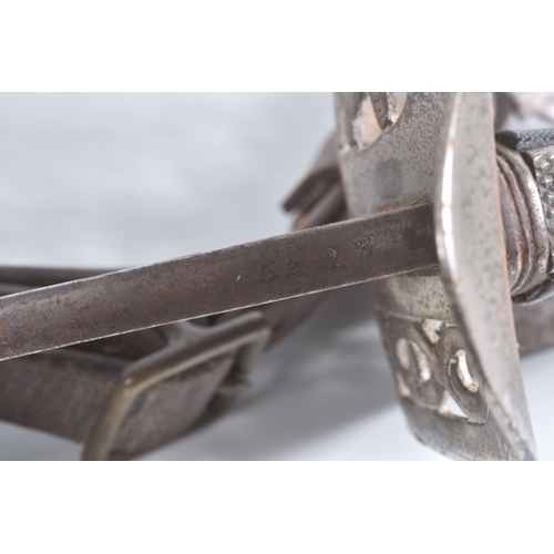 317 - A VICTORIAN OR EDWARDIAN ARTILLERY DRESS SWORD MADE BY WILKINSON, the blade is highly decorated and ... 