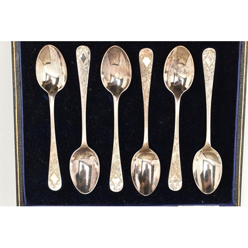 123 - A GEORGE V CASED SET OF SIX TEASPOONS, six teaspoons with engraved foliage pattern detail to the han... 