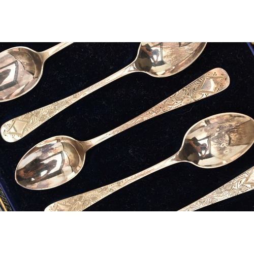 123 - A GEORGE V CASED SET OF SIX TEASPOONS, six teaspoons with engraved foliage pattern detail to the han... 